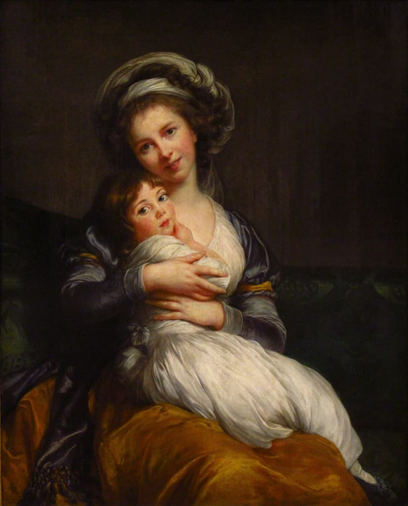 A seated woman embraces her young daughter on her lap, both facing the viewer.