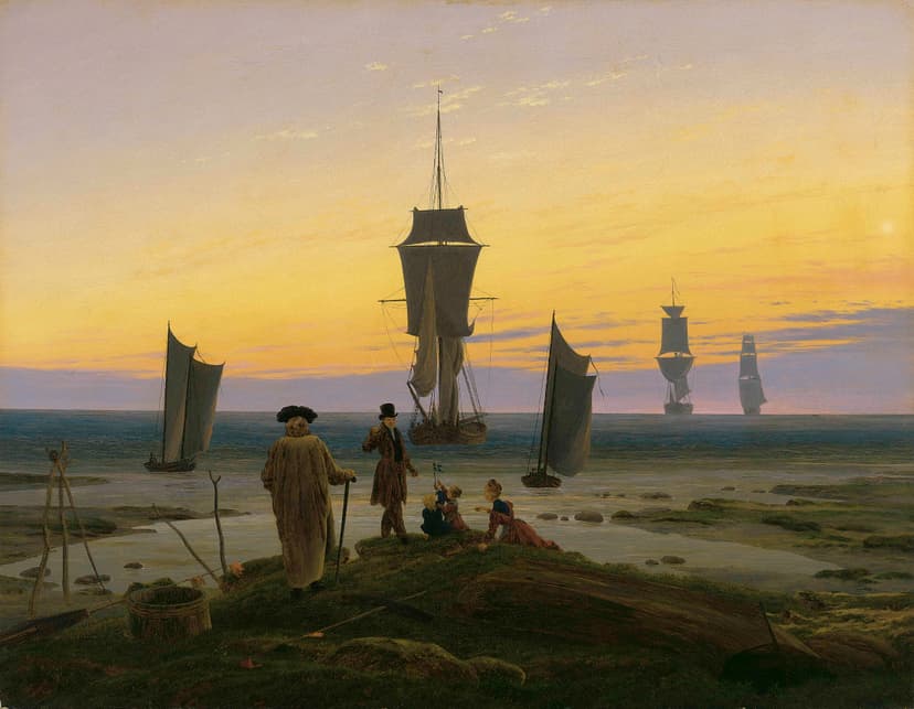 Figures of different ages on a shore as sailing ships cross the sea at dusk.