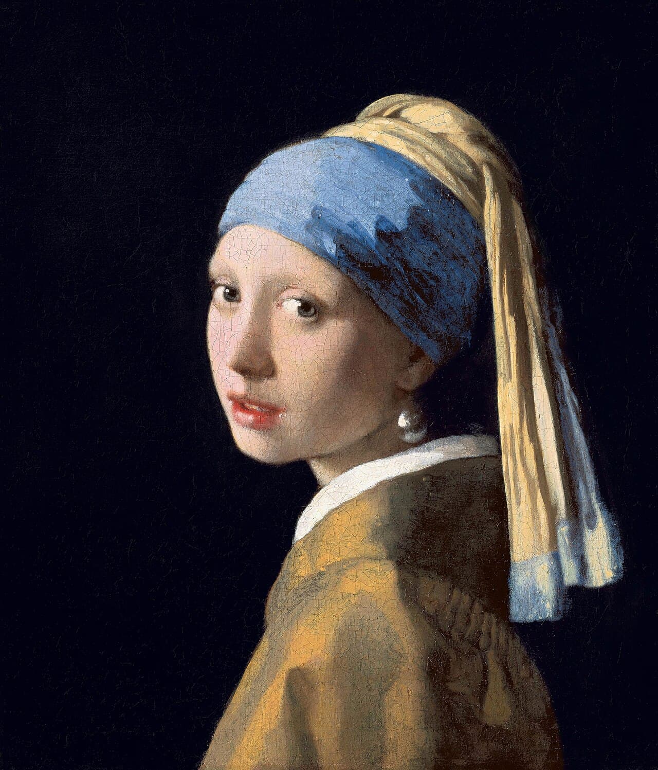 Johannes Vermeer's painting Girl with a Pearl Earring: a young woman turning to meet the viewer's gaze.